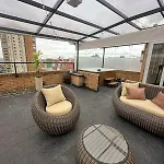 A Penthouse With A Luxury Jacuzzi And Panoramic View