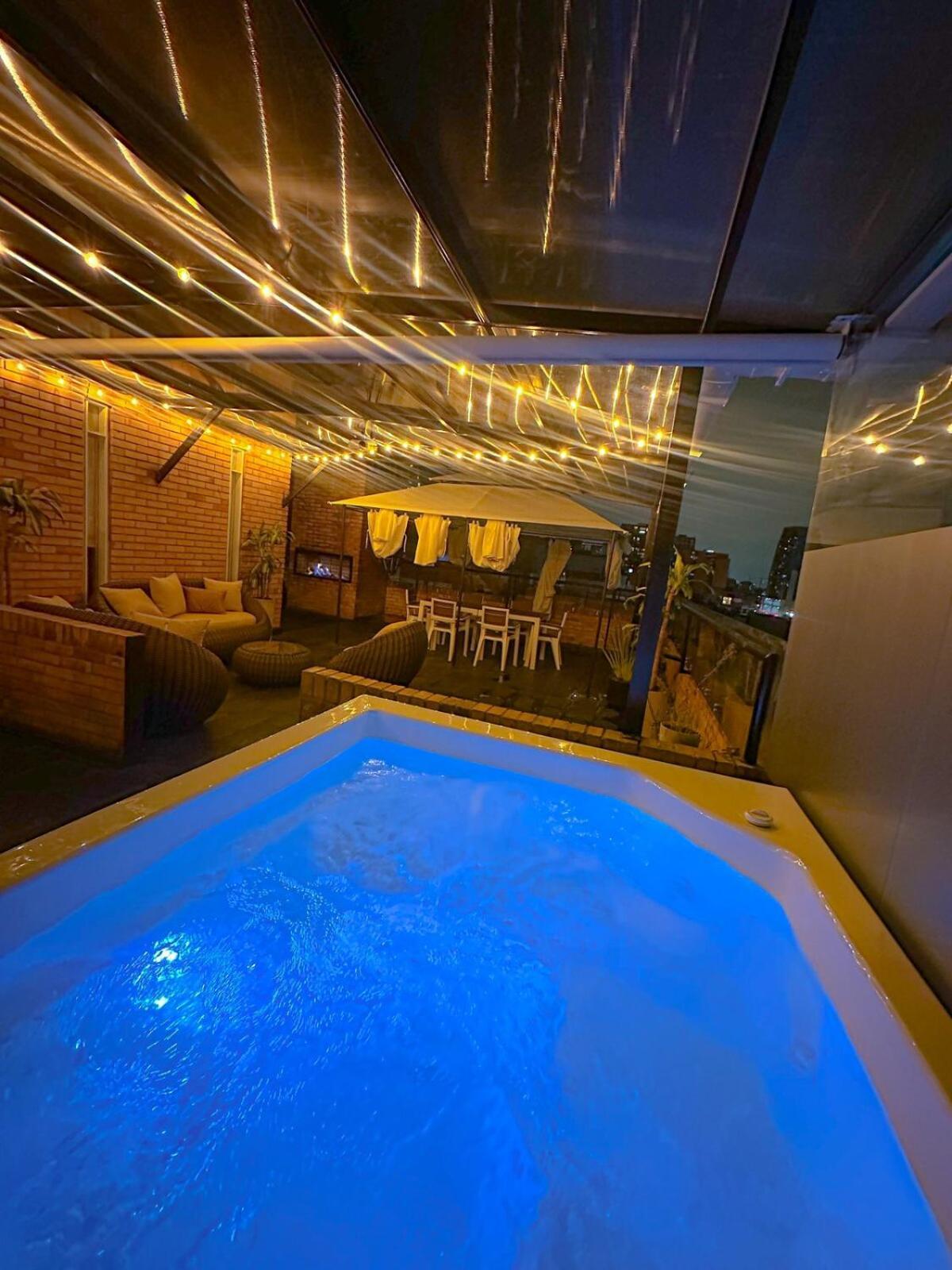 A Penthouse With A Luxury Jacuzzi And Panoramic View