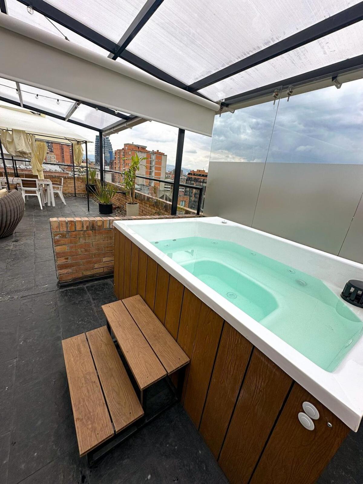 A Penthouse With A Luxury Jacuzzi And Panoramic View